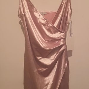 Pink draped wrap satin dress.